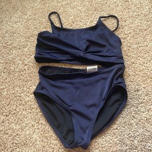 navy blue swim suit, two piece.